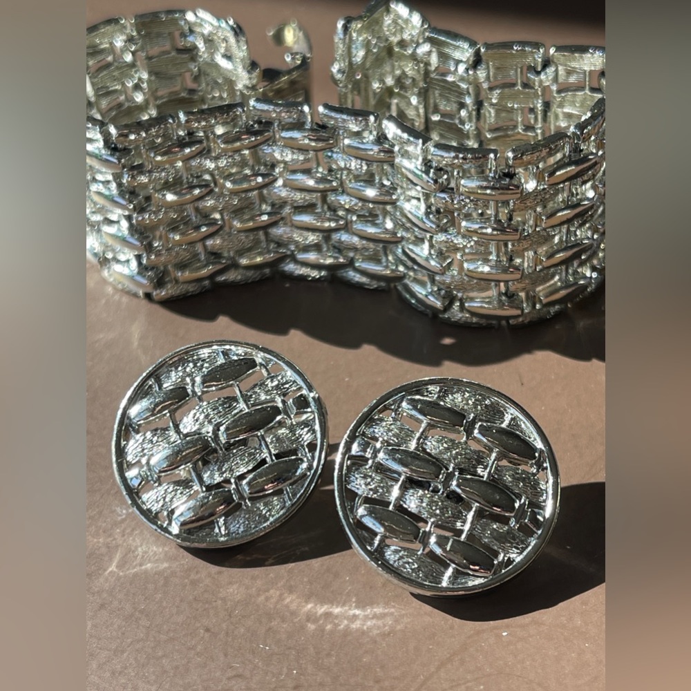 Signed Coro vintage bracelet clip earrings, flexible silver tone wide